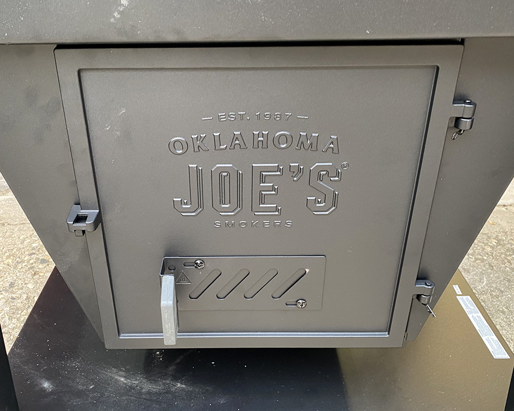Oklahoma Joe Smoker Review. Outside of Charcoal Box on the Marshal Centerbox Smoker.