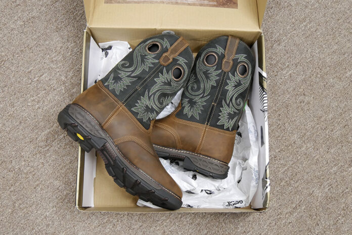 A pair of Georgia Boot Carbo-Tec FLX Waterproof Pull-on Men's Work Boots still in box