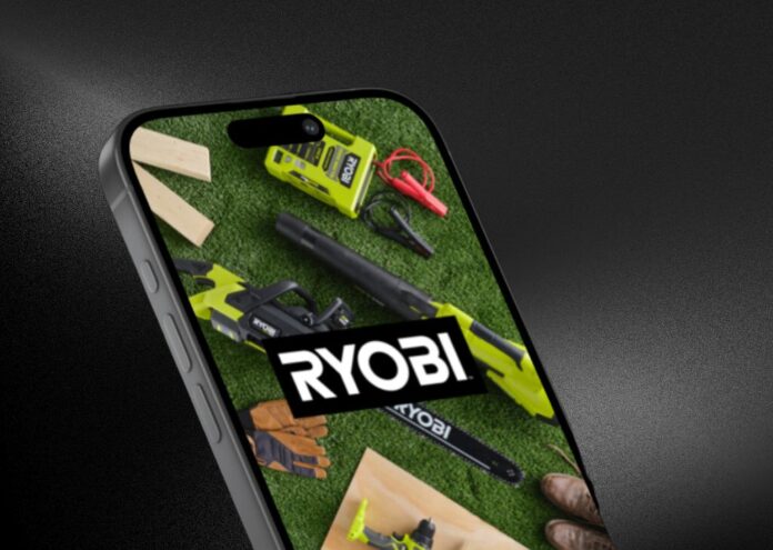 A smart phone against a background. On the phone screen displays the RYOBI app with a picture of various RYOBI power tools and OPE, with the RYOBI logo in the center.