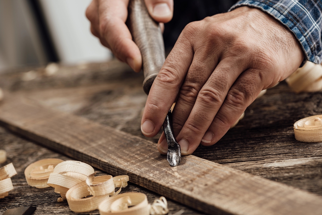 Carpenter carving wood Carpenter carving wood