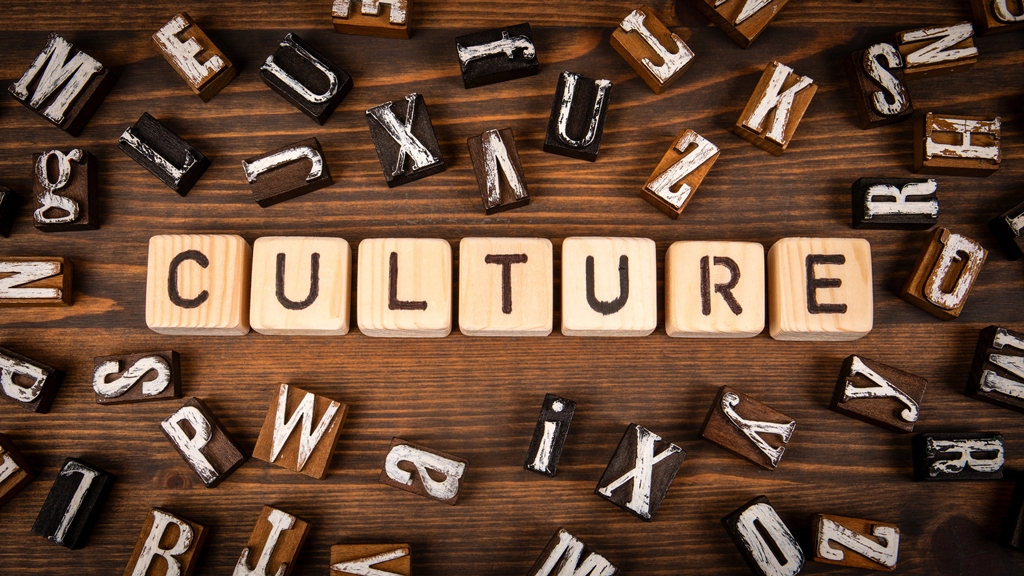 Word Culture Concept with Wooden Letter Blocks on Rustic Wooden Background Word Culture Concept with Wooden Letter Blocks on Rustic Wooden Background