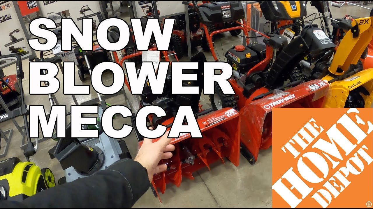 Rows of snow blowers in the aisle at Home Depot