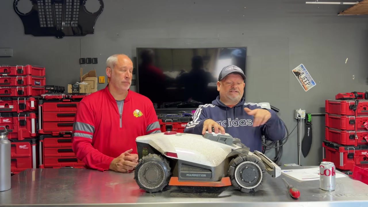 Pressing on the front of the LUBA 3 AWD to show its bumper and suspension