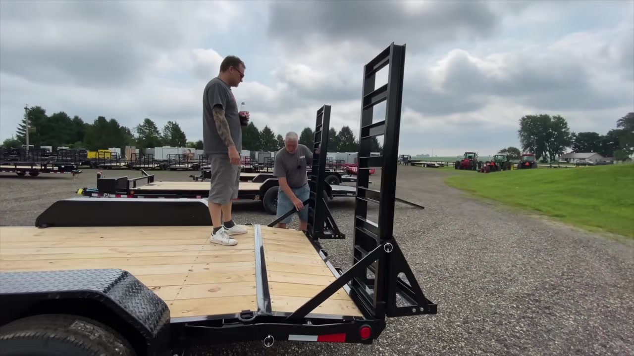 Looking over the deck and ramps of an equipment trailer