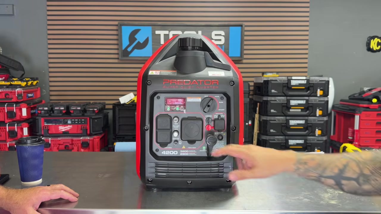 Predator 4200 inverter generator running, showing the digital display and outlets