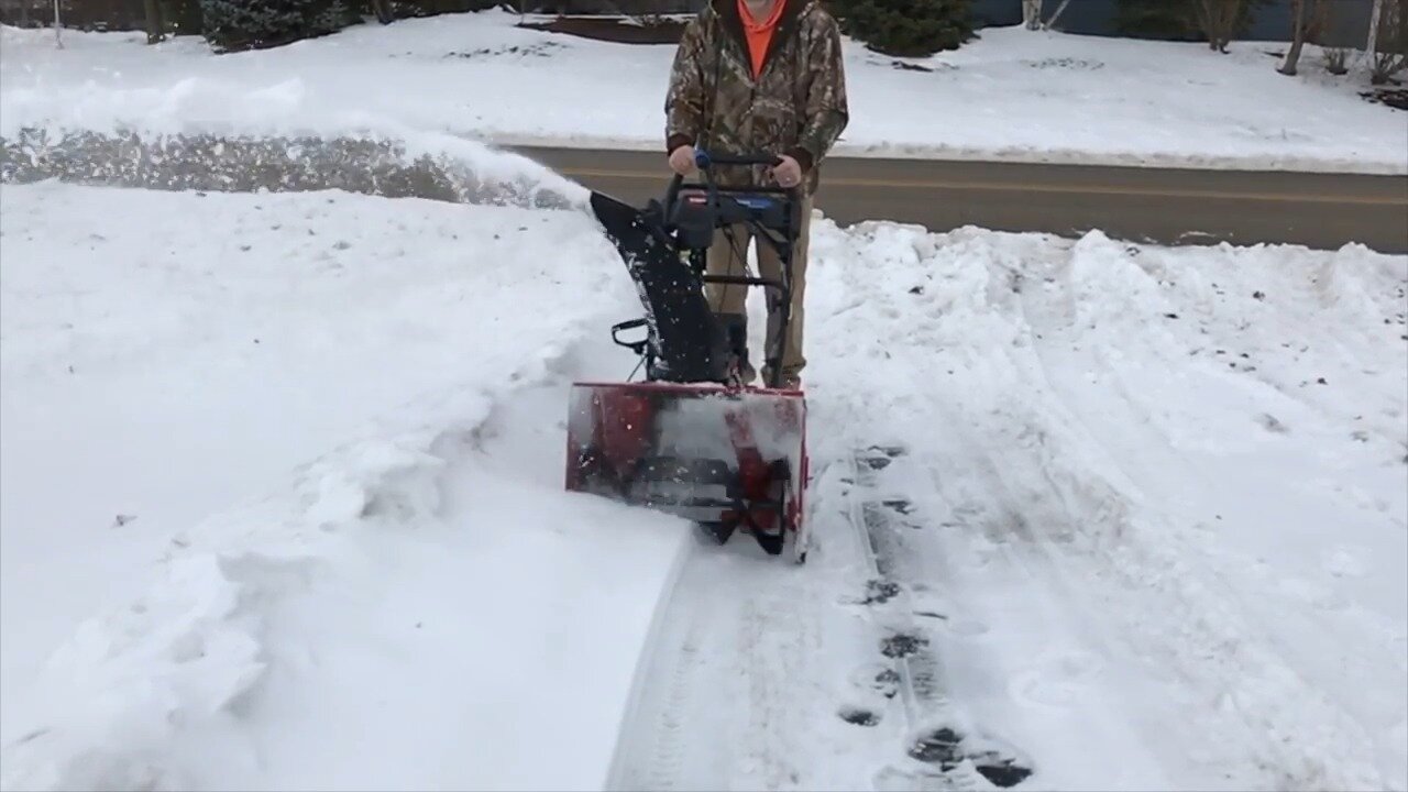 Clearing a long strip of a snow covered driveway with the Toro 724 QXE