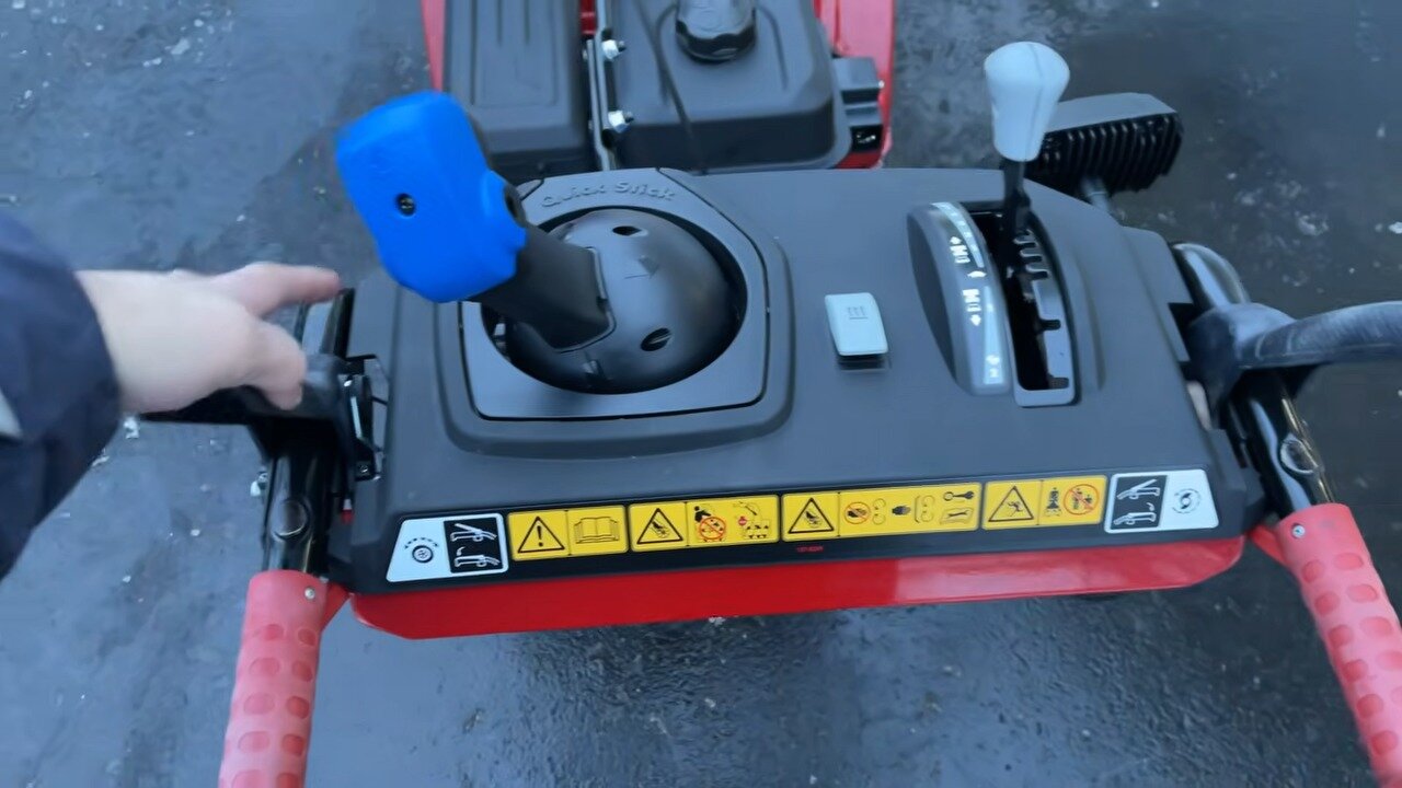 Quick Stick chute control and dash on the TORO Power Max 826 OHAE