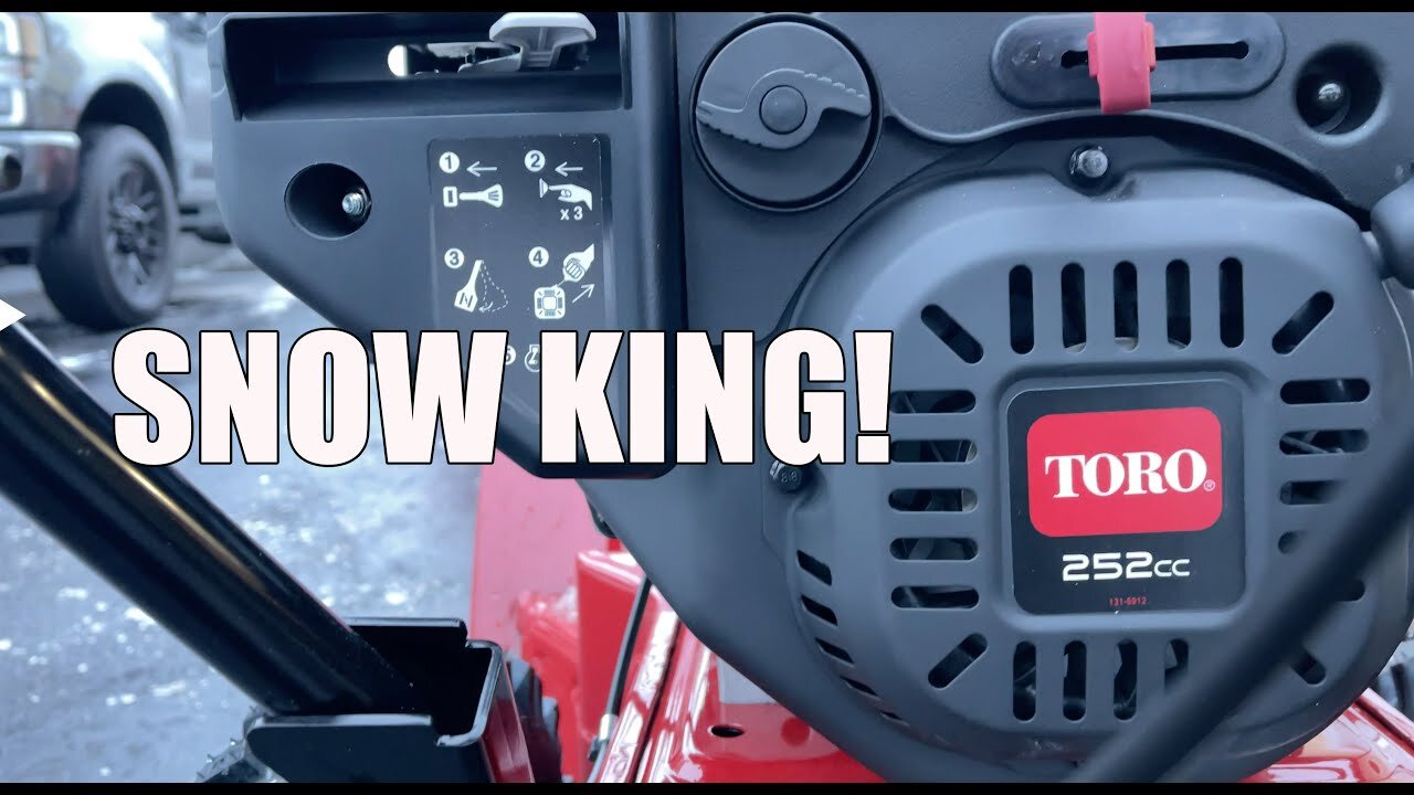 TORO Power Max 826 OHAE two-stage snow blower on a driveway