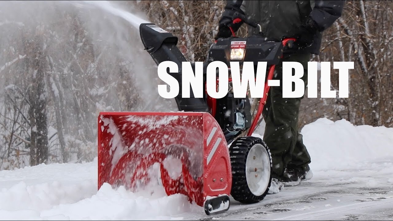 Troy Bilt two-stage snow thrower clearing deep snow