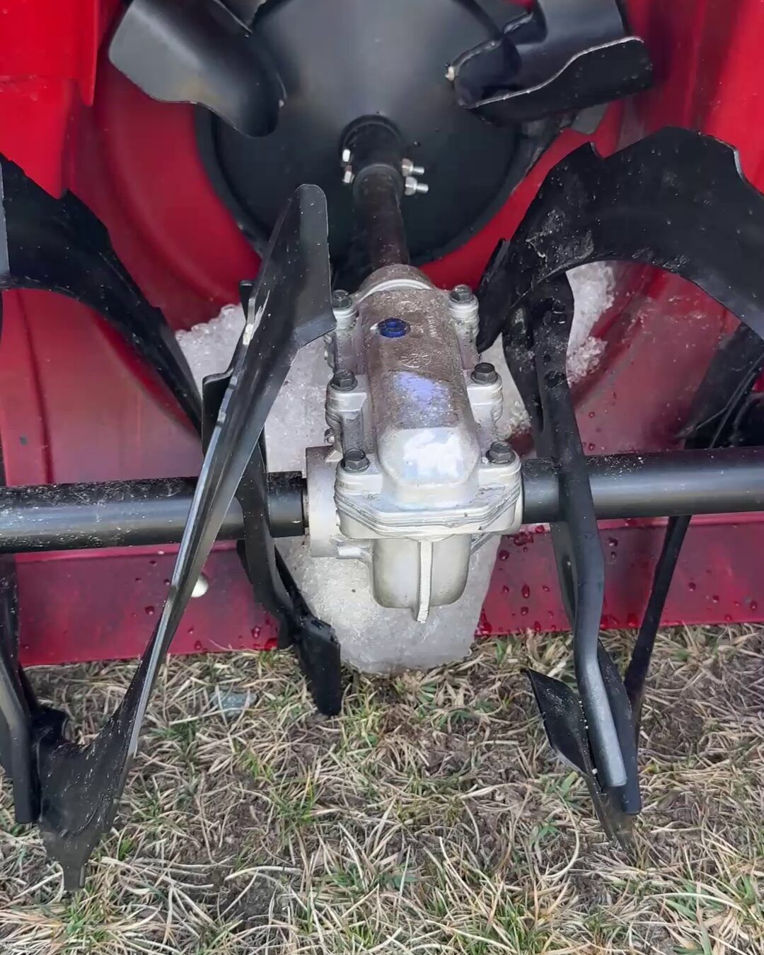Auger and impeller inside the Toro Power Max HD housing, where Toro's anti-clog technology recirculates snow