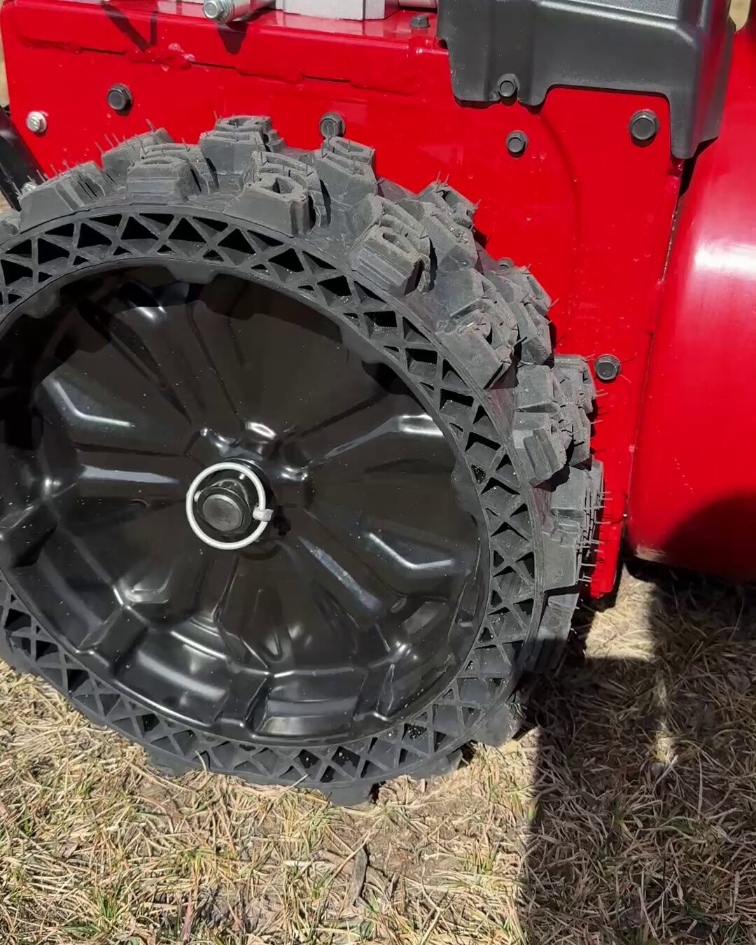 Never flat airless tire with an aggressive tread on the Toro Power Max HD snow blower