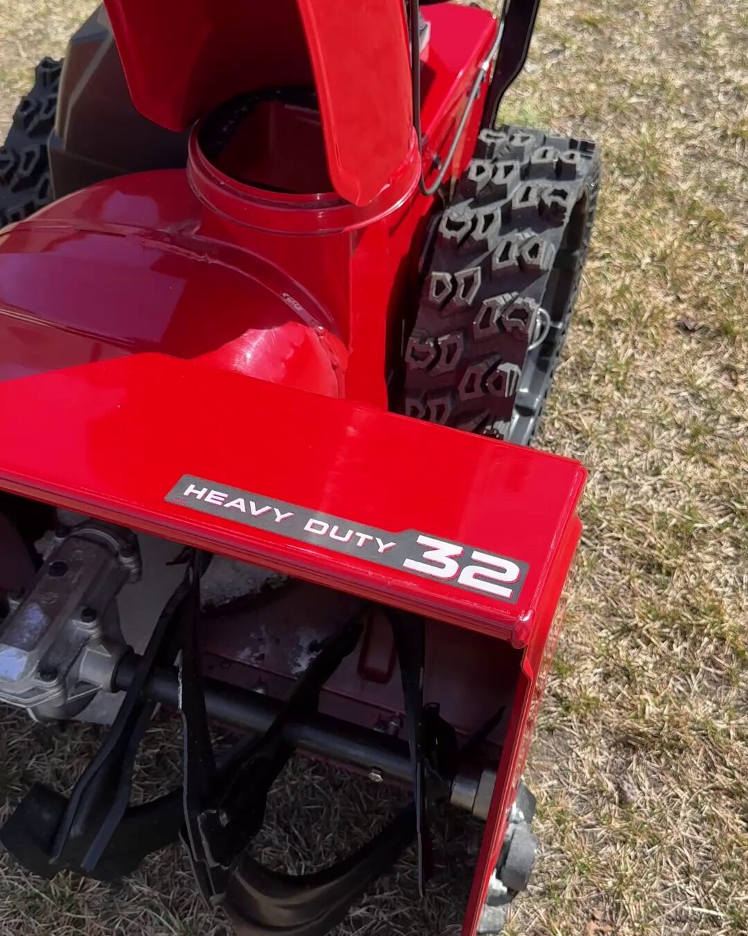 Heavy Duty 32 badge on the auger housing of the Toro Power Max HD 32 inch snow blower